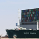 A picture taken on March 29, 2021 shows the Panama-flagged MV ‘Ever Given’ container ship after being fully dislodged from the banks of the Suez Canal, near Suez city. - The vessel, a megaship the length of four football fields, was refloated and the Suez Canal reopened to traffic in the afternoon, sparking relief almost a week after the huge container ship got stuck and blocked a major artery for global trade.